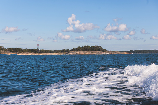 Archipelago National Park landscape, Southwest Finland, with islands, islets and skerries, Saaristomeren kansallispuisto, summer sunny day, view from shuttle ship ferry in the Archipelago Sea