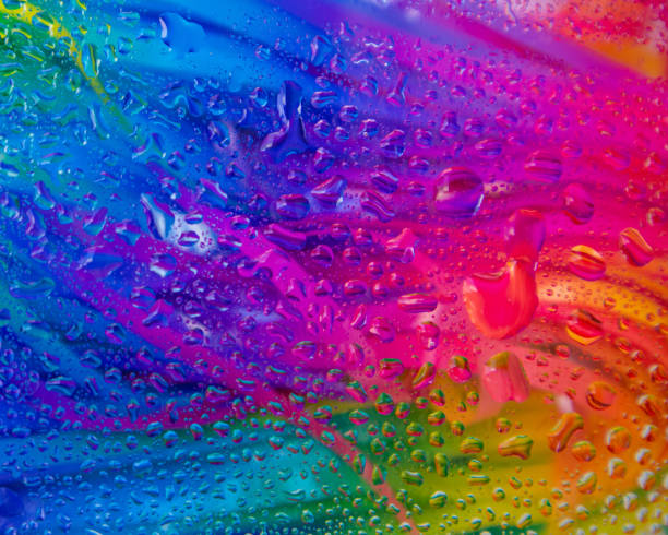 istock Abstract background. Creative modern mixing colors concept with water drops. 1451153686