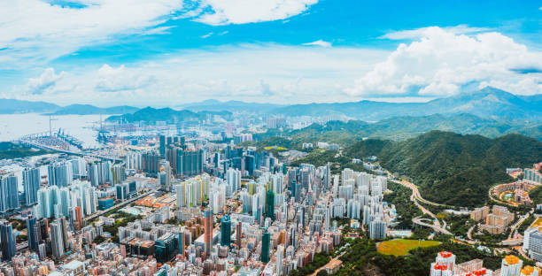 hong kong cityscape viewed from drone - kentsel dönüşüm stok fotoğraflar ve resimler