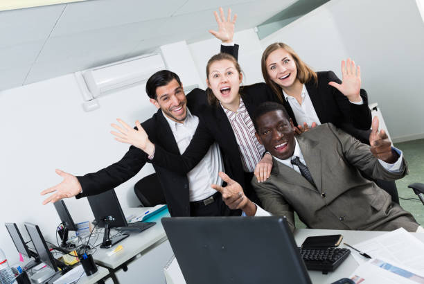 istock friendly  workgroup  business people in the office 1451158485