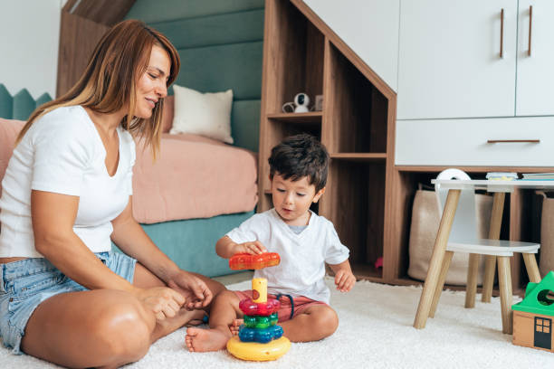 istock Mother playing with toddler 1451175827