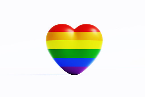 Heart textured with LGBTI flag on white background. Horizontal composition with copy space.