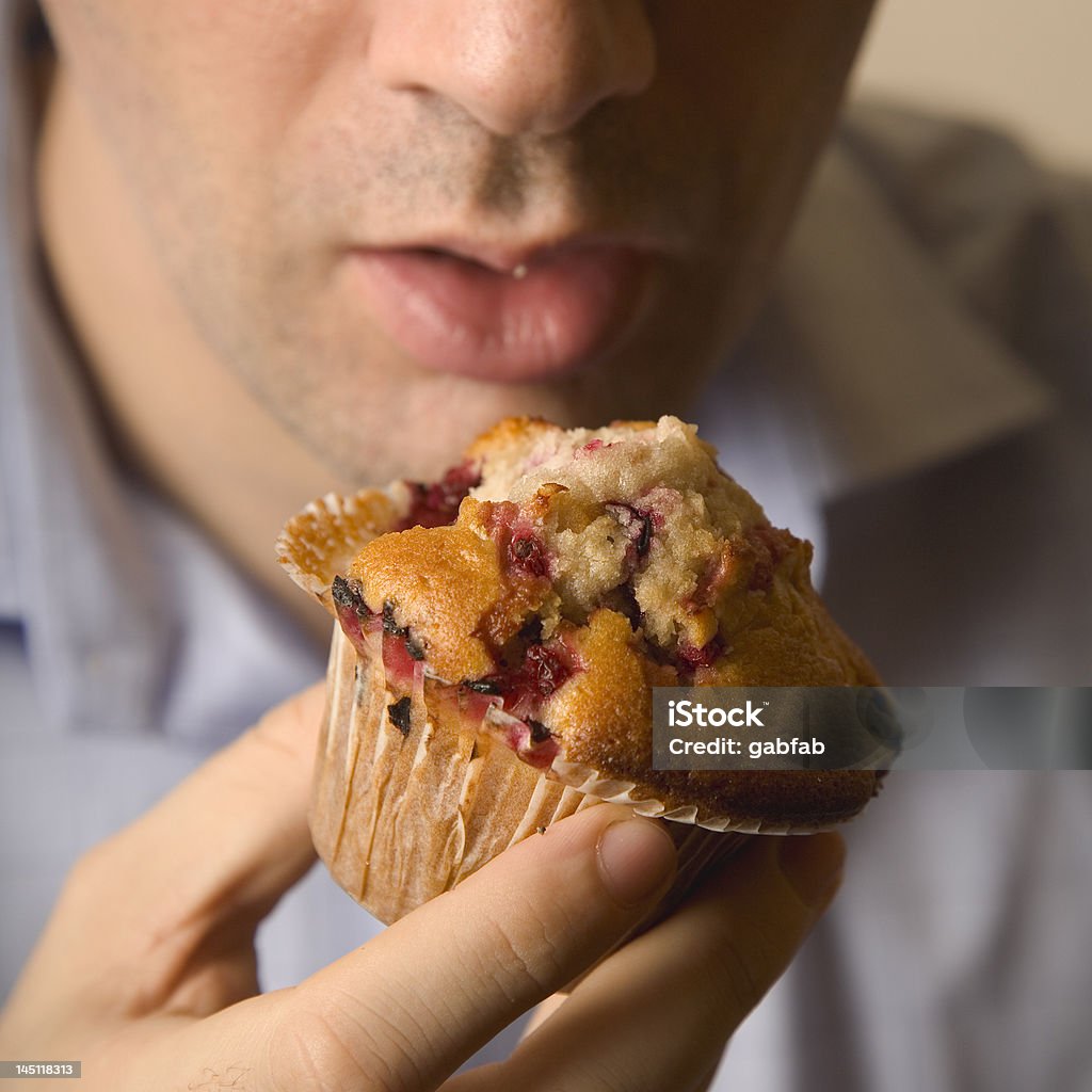 Another muffin One more bite, focuse on the muffin Adult Stock Photo