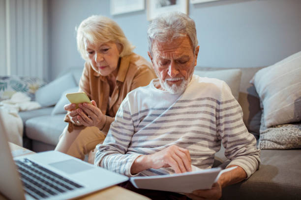 istock Senior couple going over their home finances 1451186236