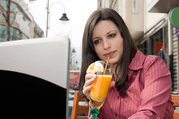 istock businesswoman working in cafe 145118711