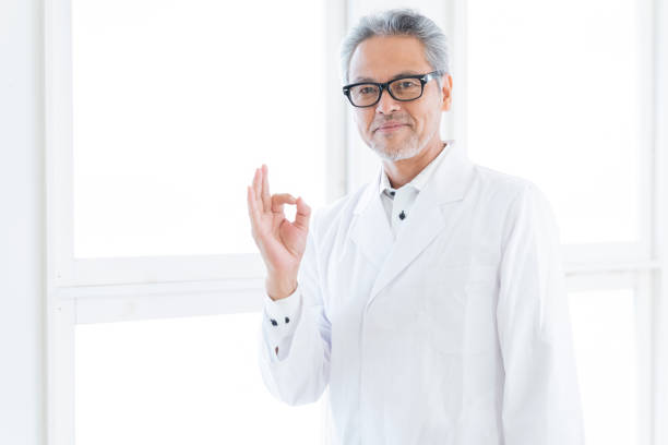 istock senior doctor in a white coat 1451188503