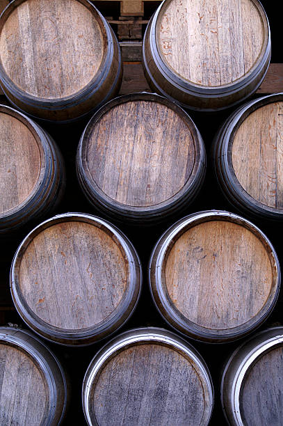 istock Stack of barrels obscured by yellow block with blue top 145118932