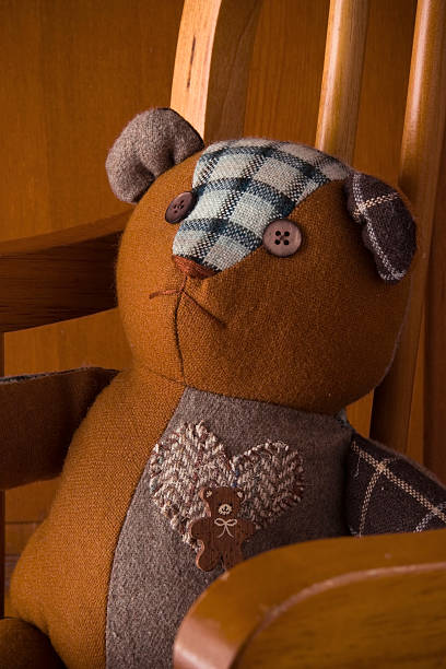 istock Teddy Bear in rocking chair 145119129