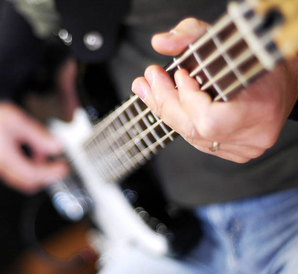 istock Playing the Bass Guitar 145119513