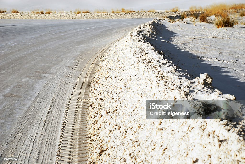 Sand road A road in a White Sands national park, New Mexico - natural colors Cloud - Sky Stock Photo