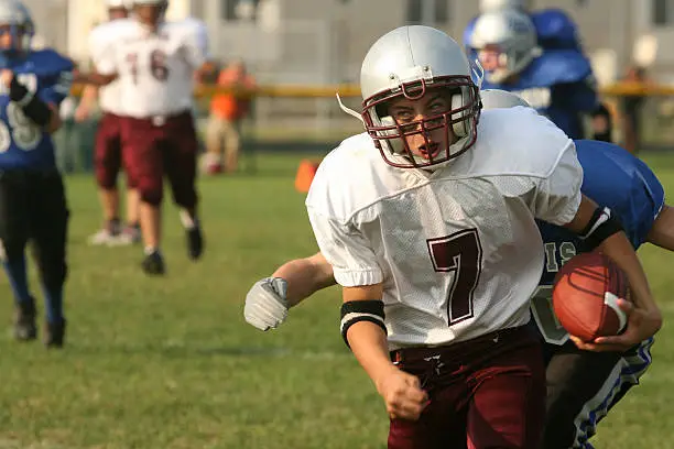 kid running for a first down