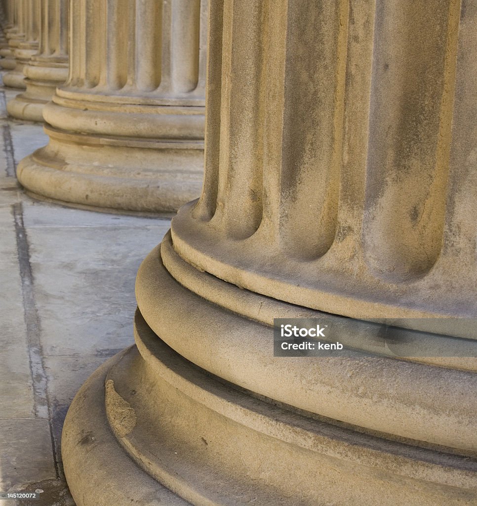 Base of neoclassical pillars Row of neoclassical pillars at St Georges Hall, Liverpool, UK Built in 1854 Business Stock Photo