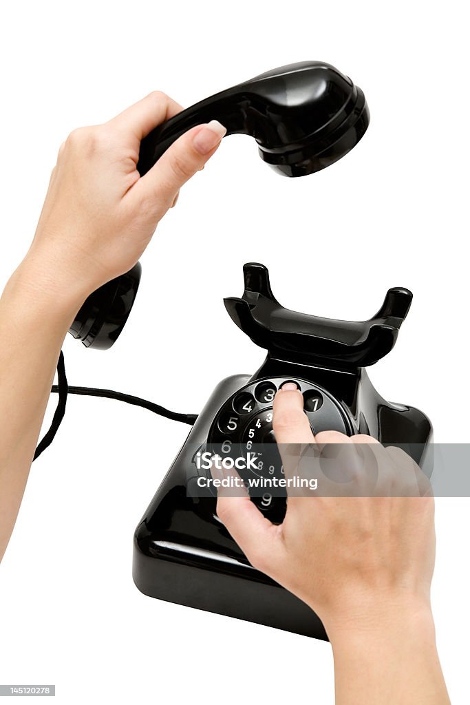 On the Phone Dialing a phone number. Isolated on a white background. Adult Stock Photo