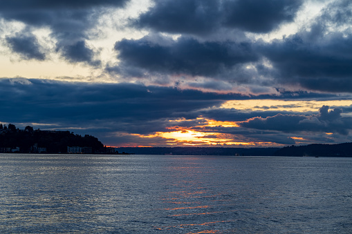 A dramatic Elliott Bay view from Pier 62 in Seattle, WA.