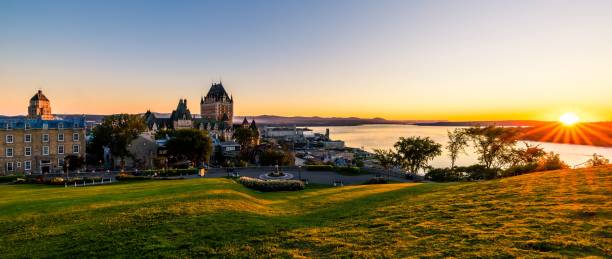 istock Panoramic view of the Chateau Frontenac surrounded by greenery in Quebec, Canada at sunrise 1451209011