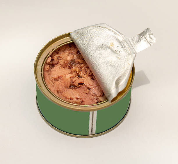 istock Open can of tuna on white 1451210559