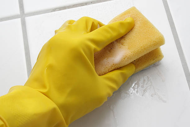 istock Hand in glove with sponge 145122460