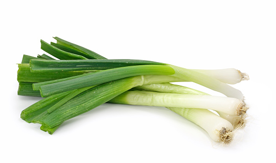  spring onions isolated on white background