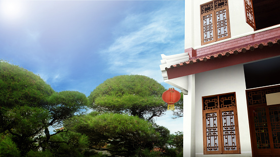 Classic house with Chinese wooden windows and doors decoration with blue sky background