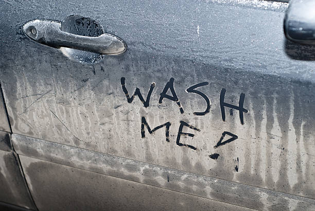 istock Wash me sign on dirty car 145122944