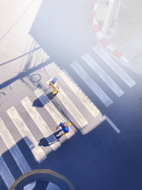 istock Walking across the crosswalk 1451233658