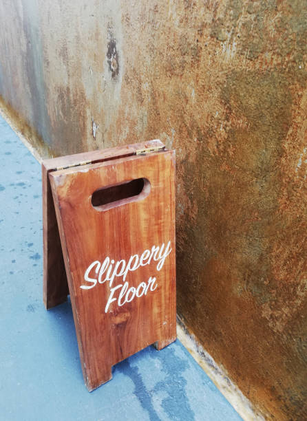istock Wooden slippery sign board placed on the floor 1451240285
