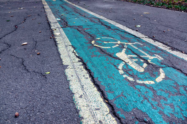 istock Close up bicycle route sign on asphalt road 1451246596