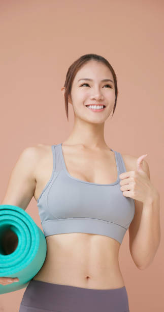 istock woman doing yoga 1451246766
