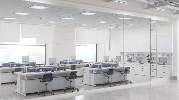 istock Outside View Of Empty Science Laboratory With White Desks, Microscopes And Other Scientific Equipments 1451253032