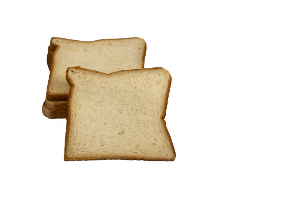 istock Slices of white bread isolated on white background 1451257998