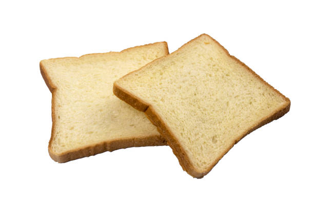 istock Slices of white bread isolated on white background 1451258017