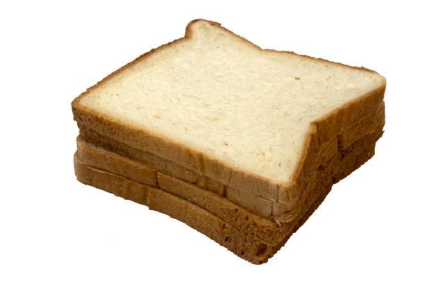 istock Slices of white bread isolated on white background 1451258023