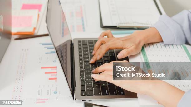 Closeup Group Of Asian Business People Meeting Discuss Project Plan And Financial Results In Office Stock Photo - Download Image Now