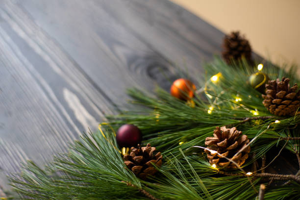 istock Composition with decorated Christmas tree on dark rustic wooden background with copy space for text. eco style christmas. Top view. 1451260343