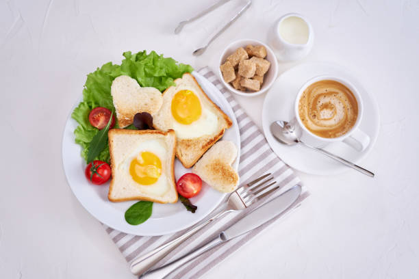 istock Fried Egg on Toast Bread and cup of fresh hot coffee on light grey background 1451281596