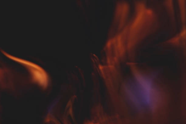istock light flare overlay defocused glow orange on dark 1451282013