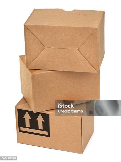 Stack Of Three Cardboard Boxes Stock Photo - Download Image Now - Arrow Symbol, Box - Container, Brown