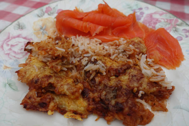 istock Eggplant Riste gratin and baked basmati rice served with smoked salmon 1451285458