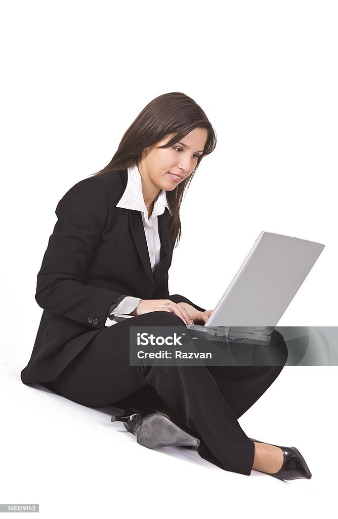 Mulher de negócios trabalhando em um laptop - Foto de stock de 20 Anos royalty-free