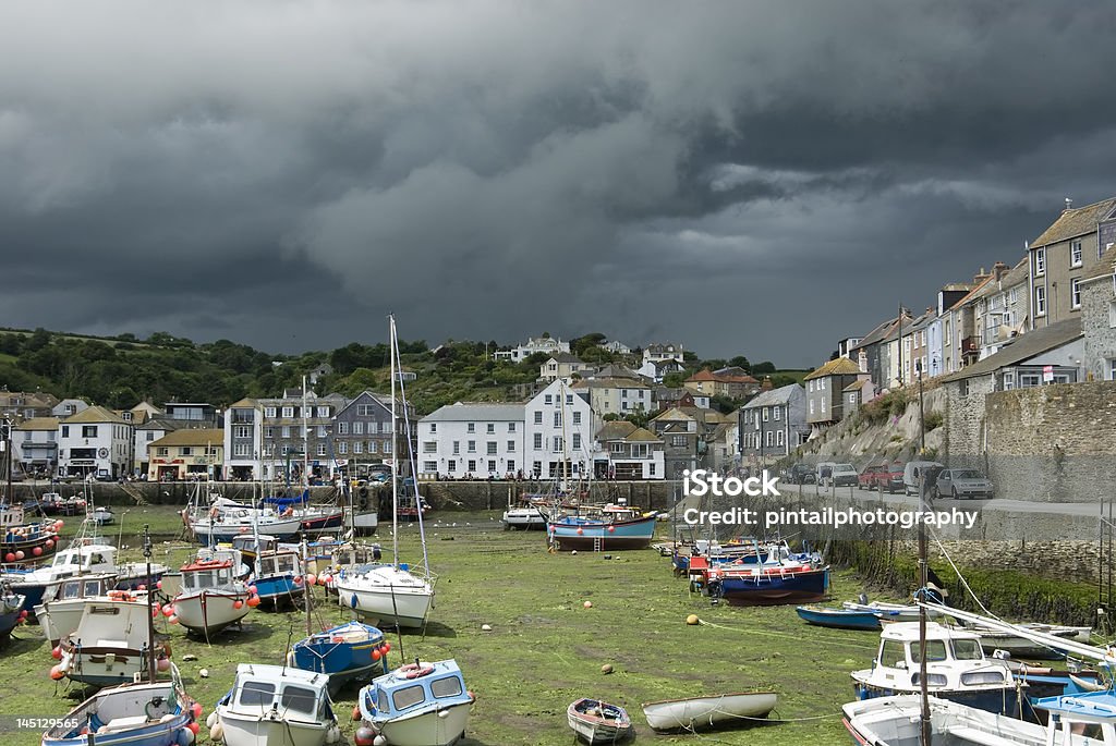 Stormy Day Mevagissey Harbour on a stormy day. Beach Stock Photo