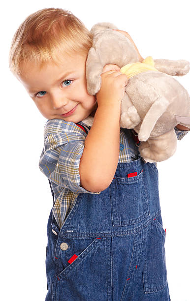istock Cute child with plush toy 145129780