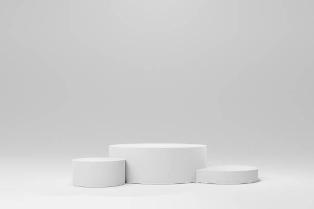 istock Simple white cylinders podium product display stand stock background 1451302879