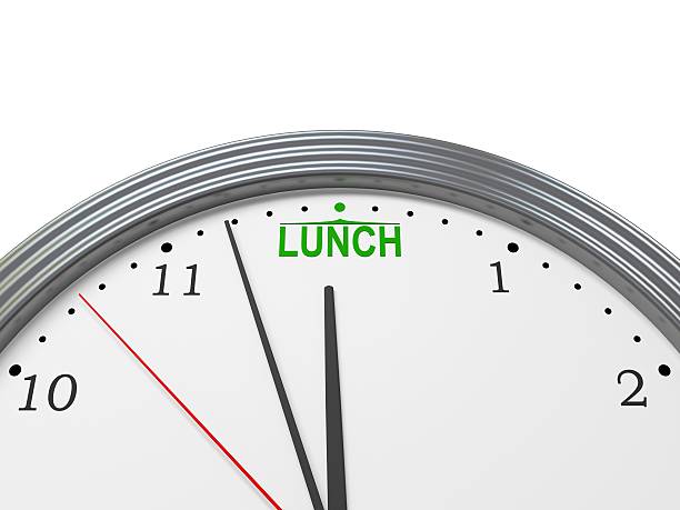 istock Close Up Of Clock Approaching Lunch Time At 12 Noon 145130775