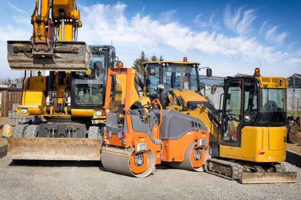 Construction machinery at the construction of a local road in the suburbs of Szczecin, Poland