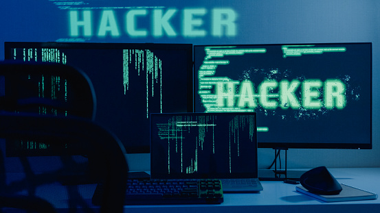 Computer hacker breaks into government data servers and infects the system with virus in night. Cyber security concept.