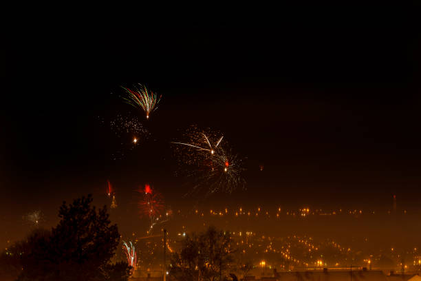 istock Fireworks over a city at night 1451312942
