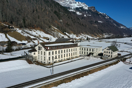 Diesbach with the former Textil Factory Legler. The Factory was in service from 1870 till 2001. The high angle image was captured during winter season.