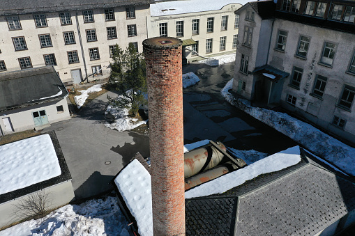 Diesbach with the former Textil Factory Legler. The Factory was in service from 1870 till 2001. The high angle image was captured during winter season.