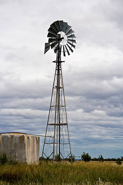istock Country Windmill Against Stormy Skies 145132198