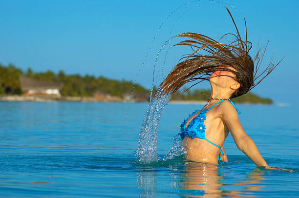 「スプラッシュ」 - splashing maldives human hair spray ストックフォトと画像